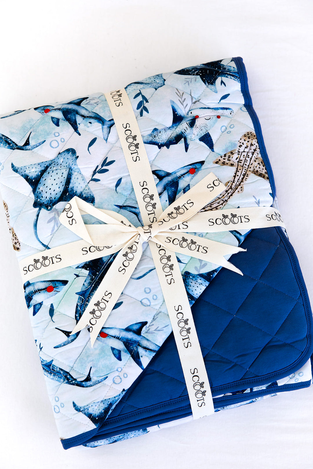 Chomp Squad Quilted Blanket