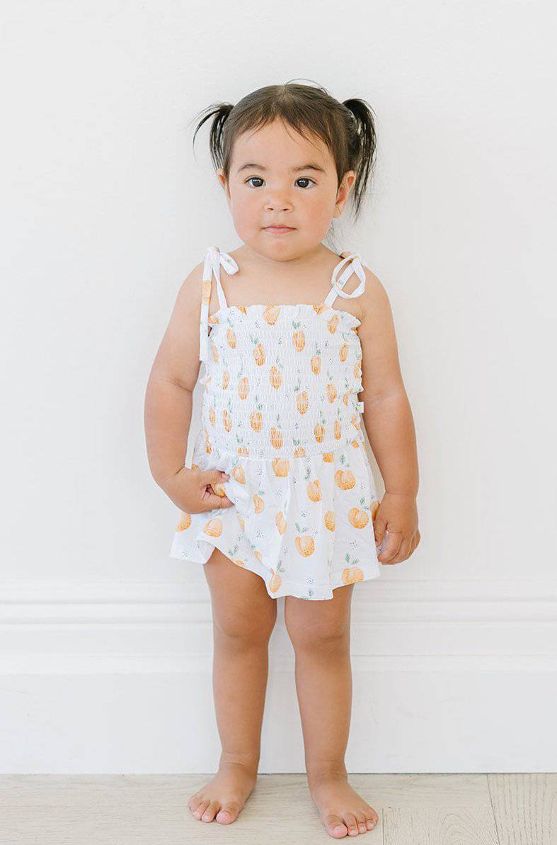 Peachy Smocked Romper - scoots