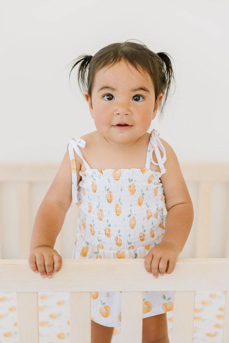 Peachy Smocked Romper - scoots