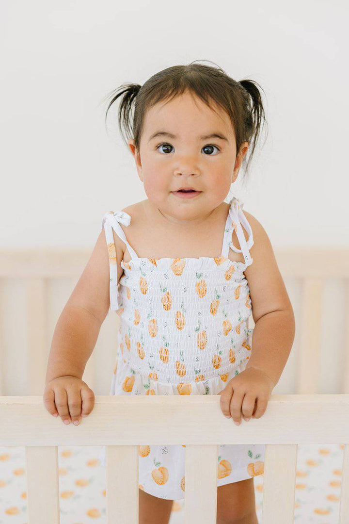 Peachy Smocked Romper - scoots