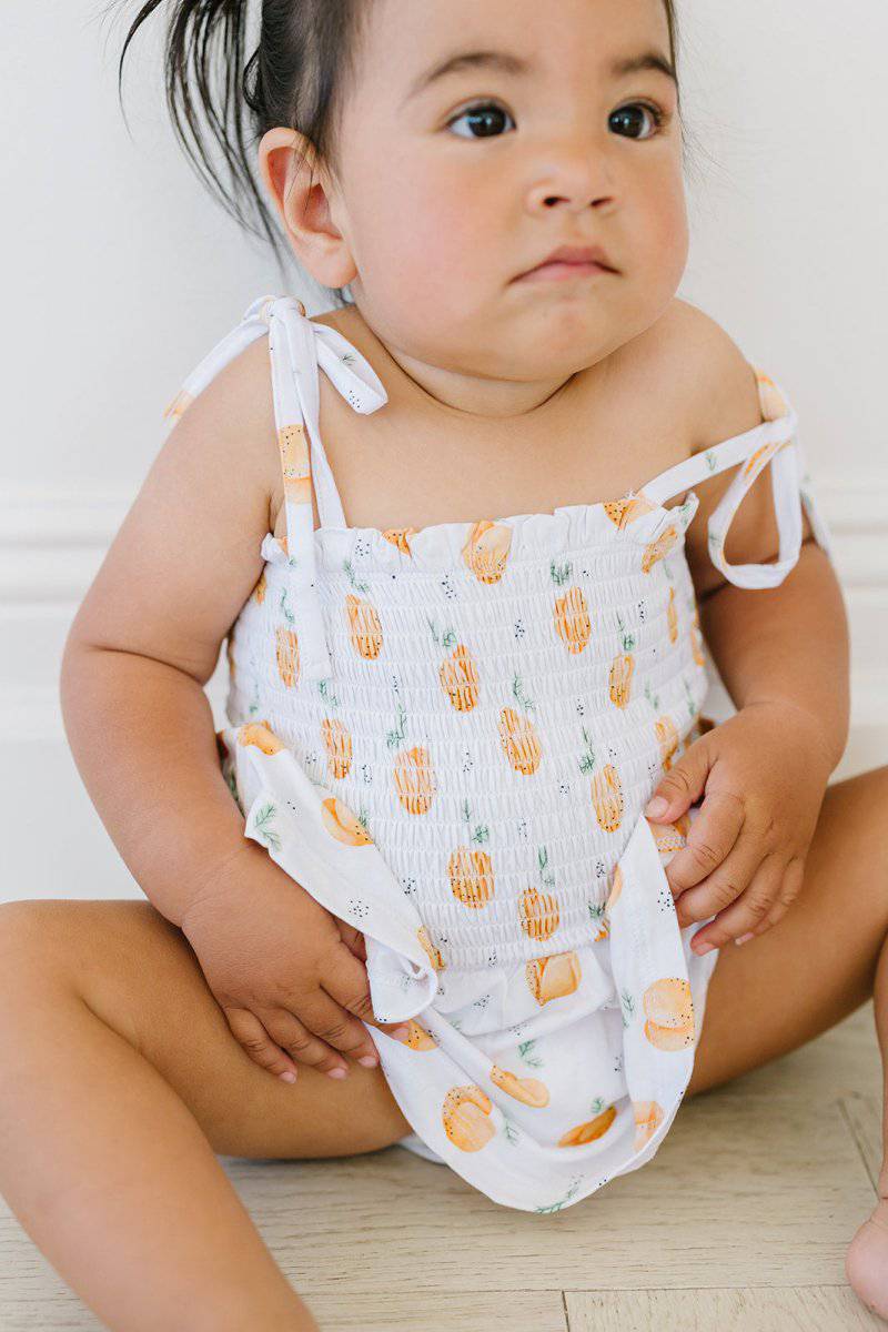 Peachy Smocked Romper - scoots